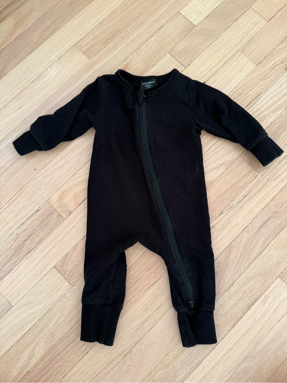 LITTLE BIPSY Black Zip-Front Baby One-Piece